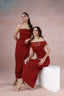 Models wearing red dresses